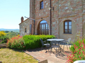 Apartment with 2 pools in the village of Asciano in the hills of Siena